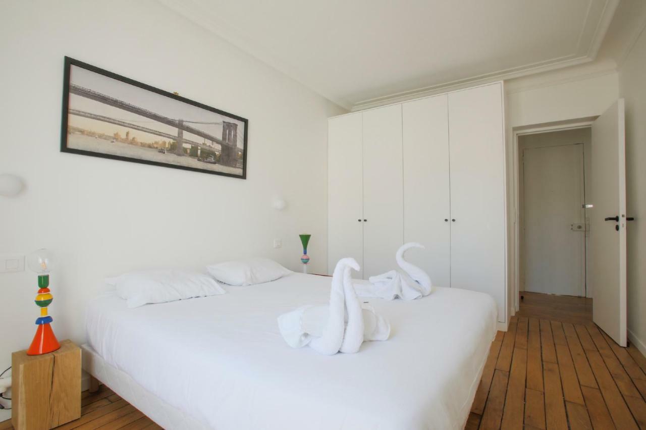 Joie Paris Tour Eiffel - Rue Cler Apartment Bagian luar foto